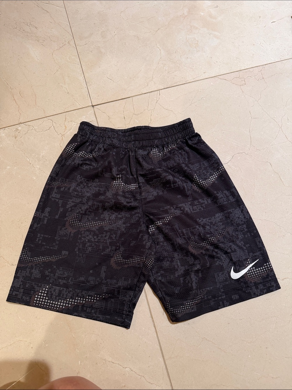 Nike kids size 7 Black Athletic Shorts with White Swoosh